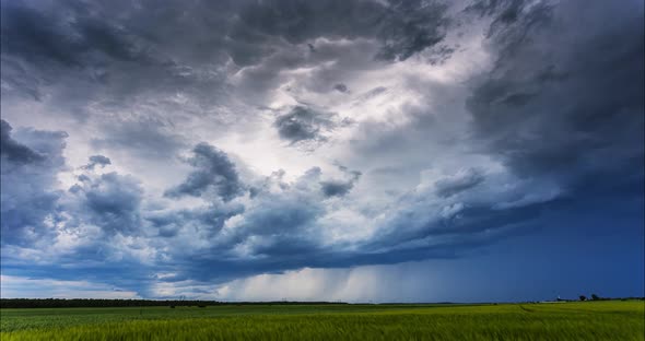 -Timelapse Storm Clouds and Heavy Rain. Timelapse of the Beginning of a Thunderstorm