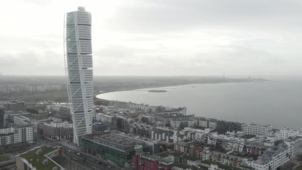 Turning torso, gloomy day, sun showing a little