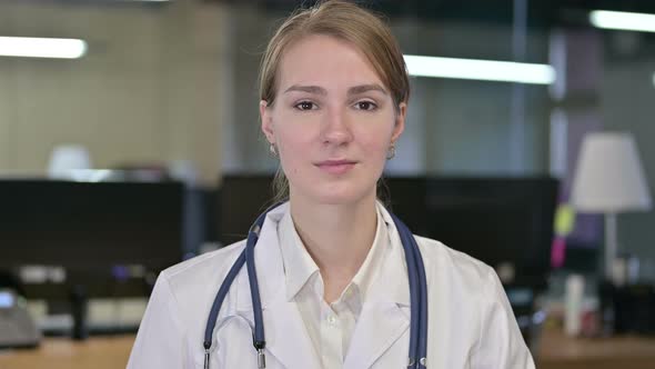 Portrait of Young Female Doctor Looking at the Camera 