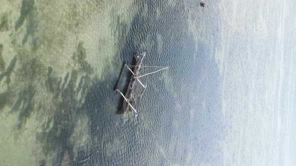 Vertical Video of Low Tide in the Ocean Near the Coast of Zanzibar Tanzania Aerial View