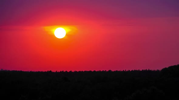 Sunset in the Purple Sky. Amazing Colors of the Setting Sun. Timelapse