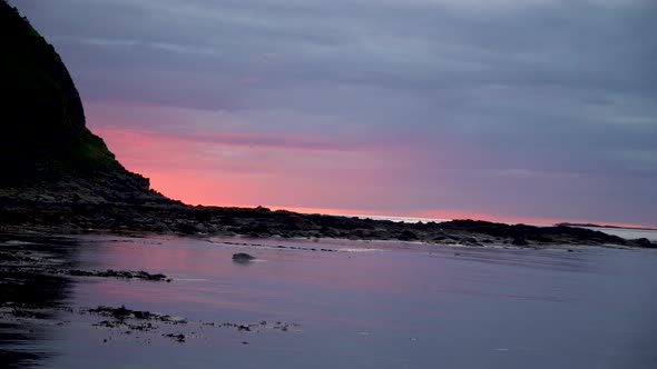 Midsummer night falls over the northern polar circle in a beautiful scenery