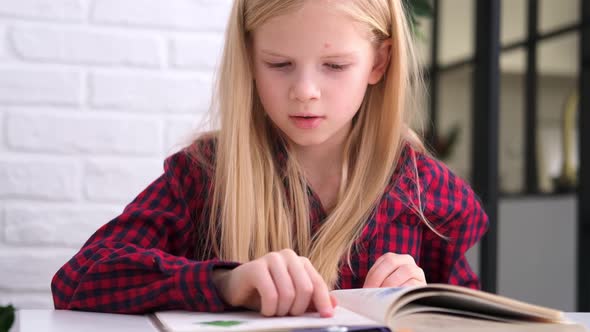 Blonde Schoolgirl Studying at Home Doing School Homework