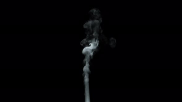 A Stream of White Cigarette Smoke on a Black Isolated Background