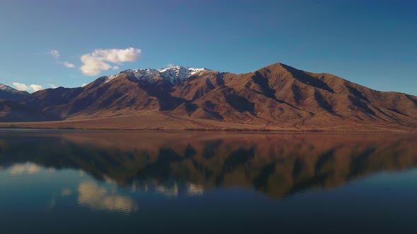 Panoramic View over the Mountains and Lake Benmore in New Zealand - Pan Shot