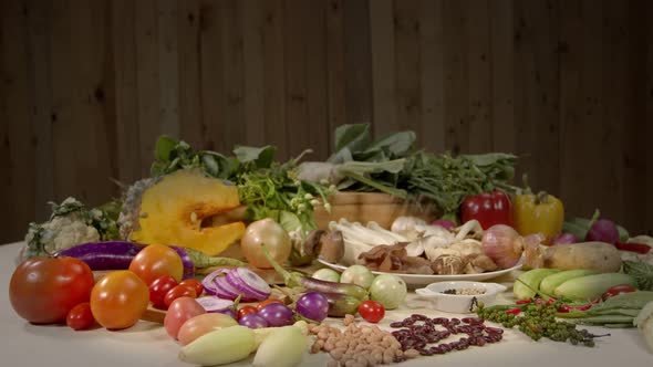 Various Vegetabl In A Table On Wooden Background