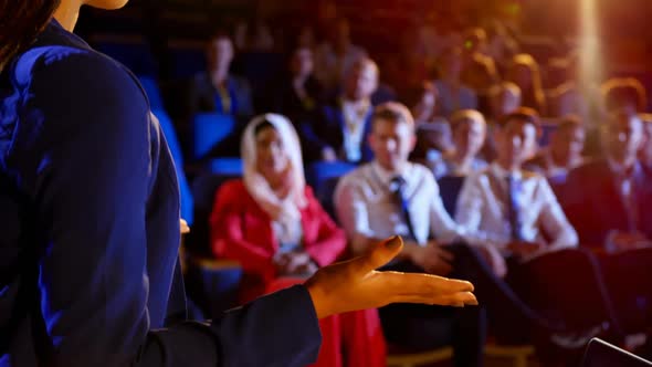 Businesswoman speaking in business seminar at auditorium 4k