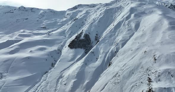 Aerial view of beautiful snowy mountains in Gudauri, Georgia