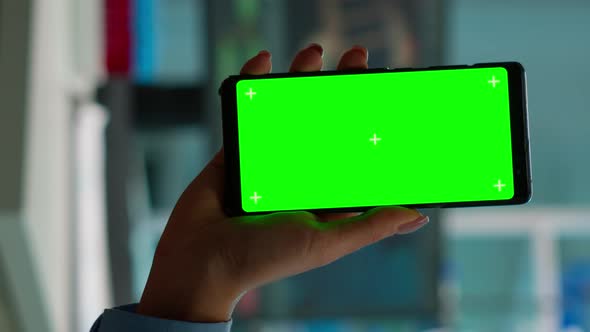 Vertical Video Chroma Key Isolated Display on Smartphone Used By Scientist Woman
