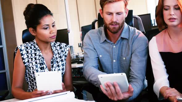 Executives working together at the desk