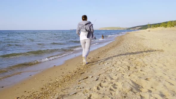 A Girl Runs to the Coast