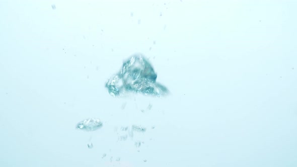 Water Bubbles Going Up In White Background