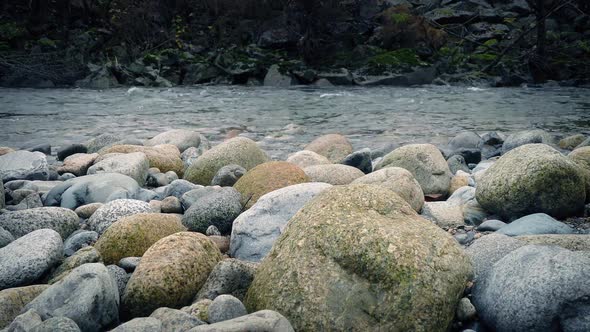 Passing River in Rugged Rocky Area