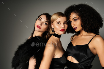 Elegance unleashed: three svelte women in ebony attire