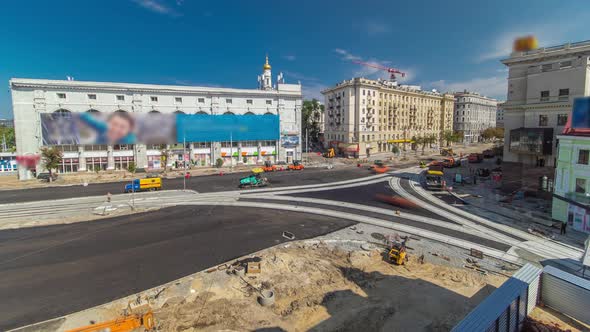 Workers Operating Asphalt Paver Machines During Road Construction and Repairing Works Timelapse