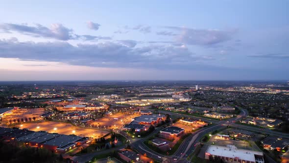 Sunset or sunrise drone aerial view of the shopping malls in Woodbury, MN