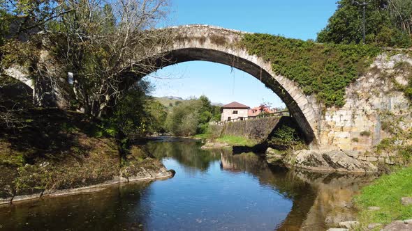 Aerial View of a Scenic Medieval Bridge in Lierganes Cantabria Spain