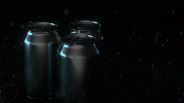 The rain drops fell on cans, cans with dark background.