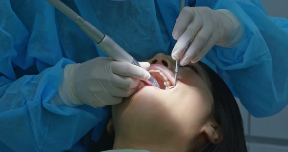 Woman undergo dental check up in the clinic