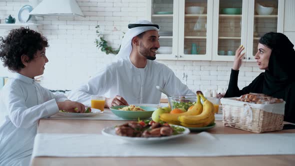 arabian family spending time together at home