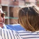 Close up of happy couple toasting with friends at rooftop party - VideoHive Item for Sale