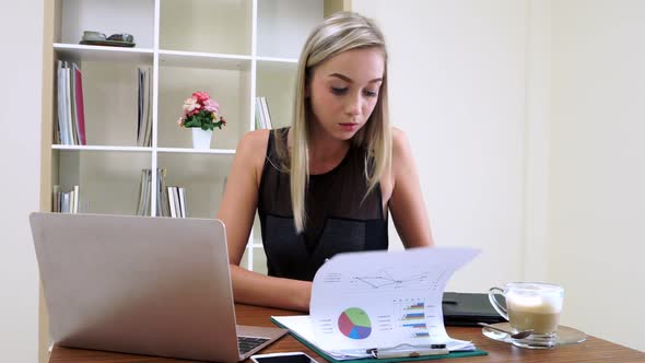 Blonde Business Woman Working at Modern Office