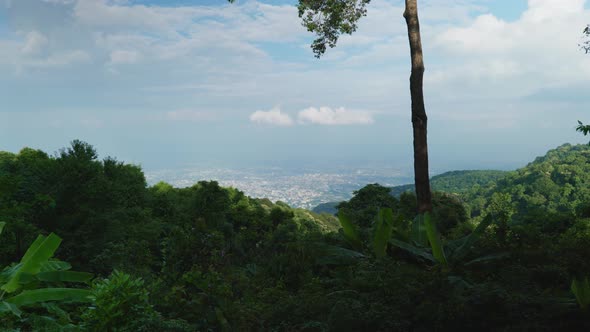 4K Cinematic landscape footage of the city of Chiang Mai, North Thailand from the top of Doi Pui on