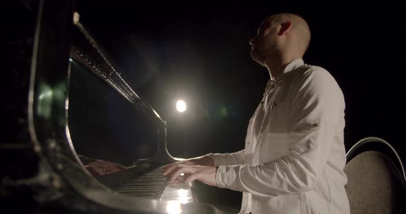 Professional Pianist Plays Gentle Classical Music on a Grand Piano. Slow Motion