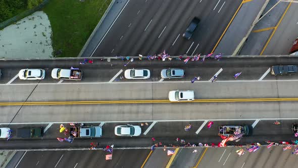 An overhead shot of President Trump supporters on an overpass in Florida