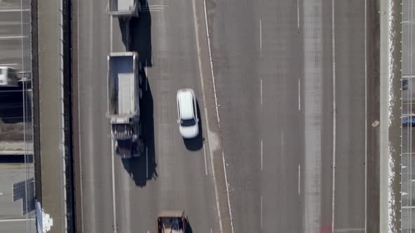 Vancouver car smog traffic highway toll road, aerial zoom out top down of multi level junction road