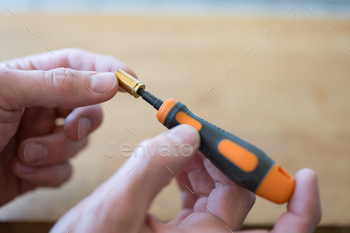 Detail of the special tool for manual cleaning of the primer housing of the pods