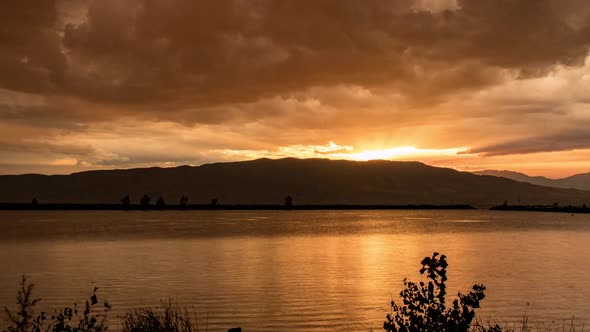 Time lapse of colorful sunset over Utah Lake