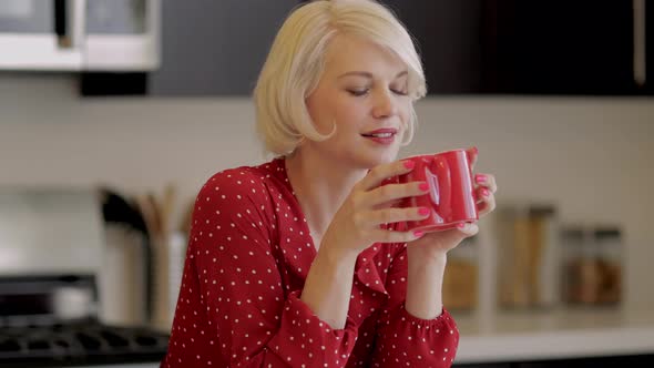 Attractive Woman Enjoying Her Coffee
