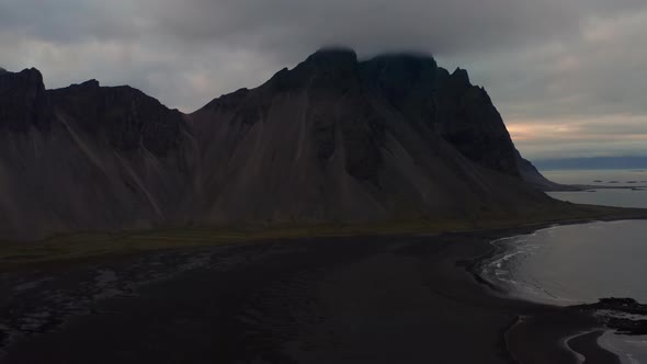 Drone Above Black Sand Beach With Vestrahorn Mountain