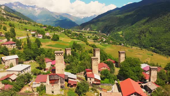 Tilt Down Aerial View To Mestia Towers