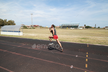 The Runner Sprint In The Athletic Track