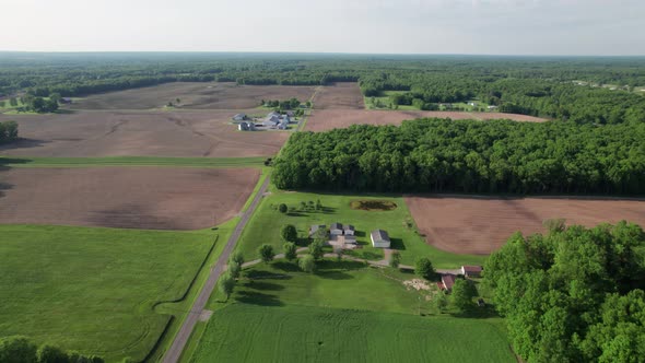 An aerial view of rural village clean sky rice filed farm. A beautiful view is seen in this video