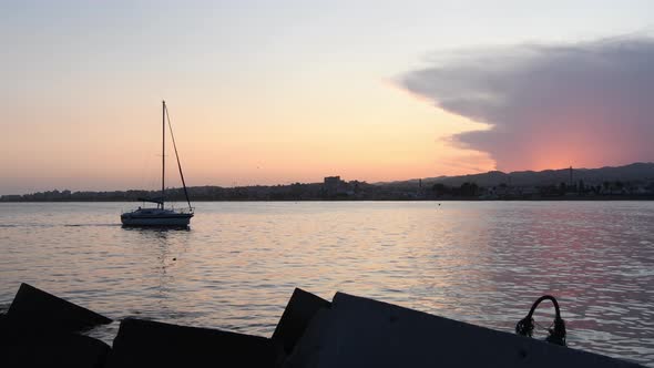 Sunset from Port with a Ship Entering