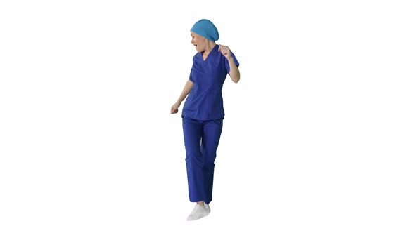 Girl Doctor Is Dancing and Walking on White Background