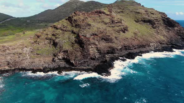 drone parallax around ocean sea cliffs with highway in the background