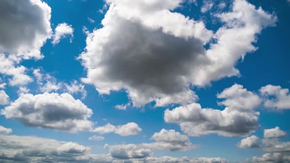 Clouds Move Smoothly in the Blue Sky. Timelapse. Cloud Space.