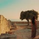 Woman Walking in the Ancient City By the Sea - VideoHive Item for Sale