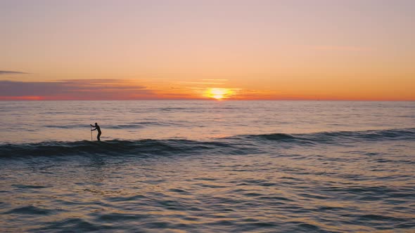 Surfer Silhouette on the Ocean