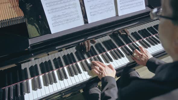 Closeup of Professional Pianist Play the Piano