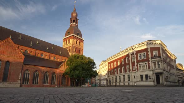 Walking Alone in the Empty Cobbled Square Near Dome Cathedral in Riga, Latvia. Deserted City Due To