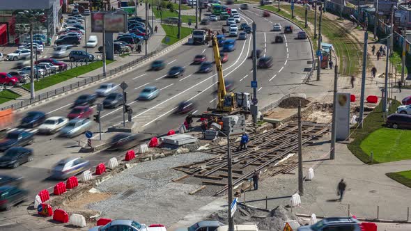 Installing Concrete Plates By Crane at Road Construction Site Timelapse