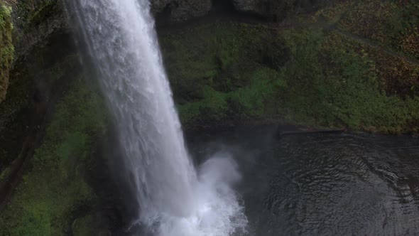 Pan up a waterfall