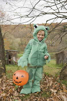 Boy in a frog costume