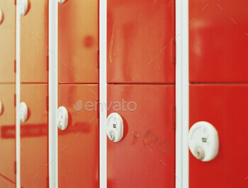 A vibrant array of red and white lockers with focus on locker number 1502.