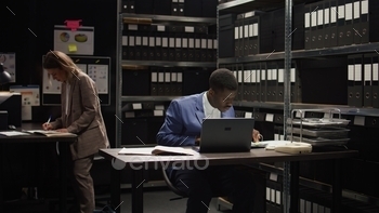 Detective analyzing classified documents